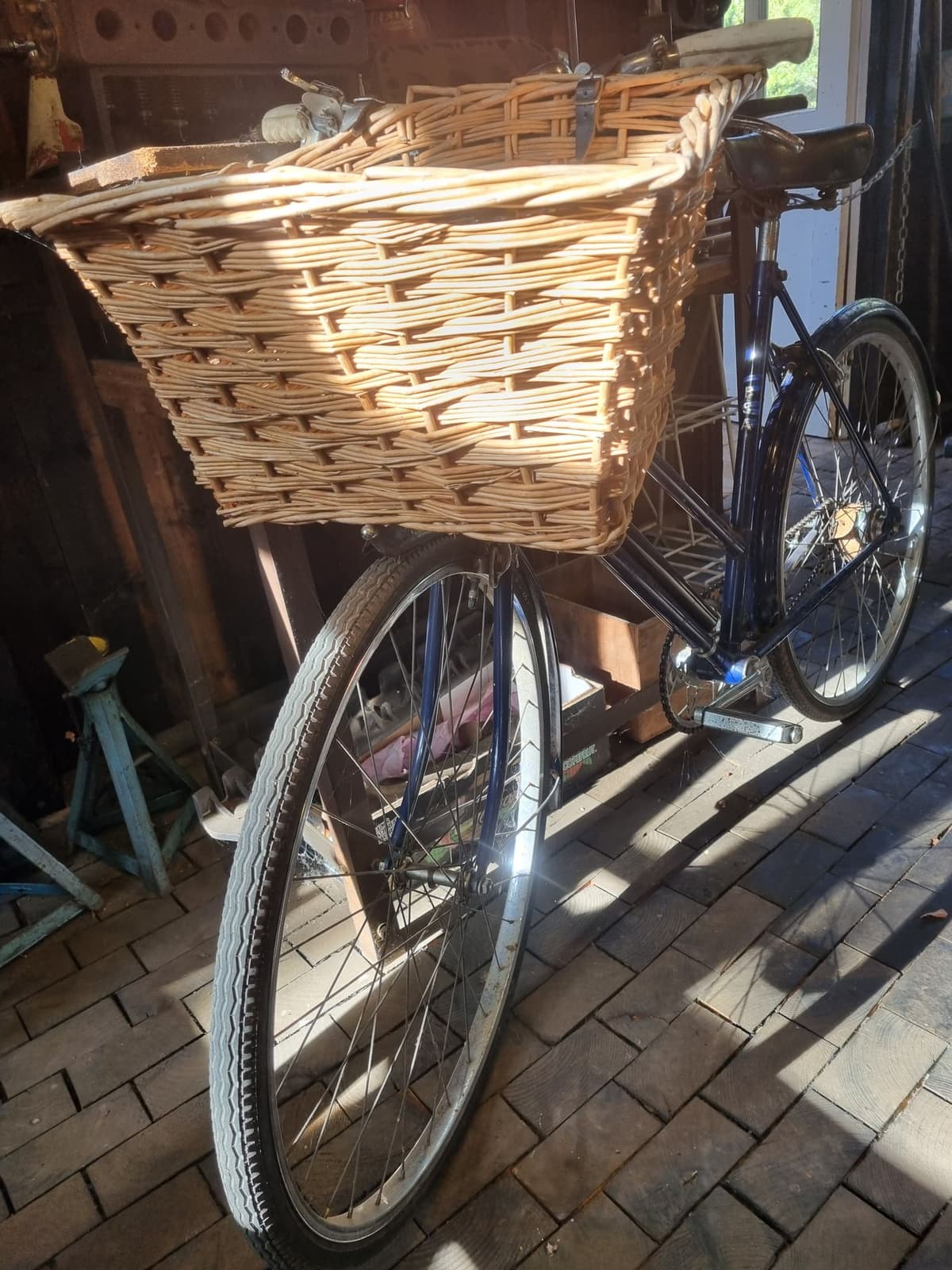 A picture of a bike with a basket on the front.